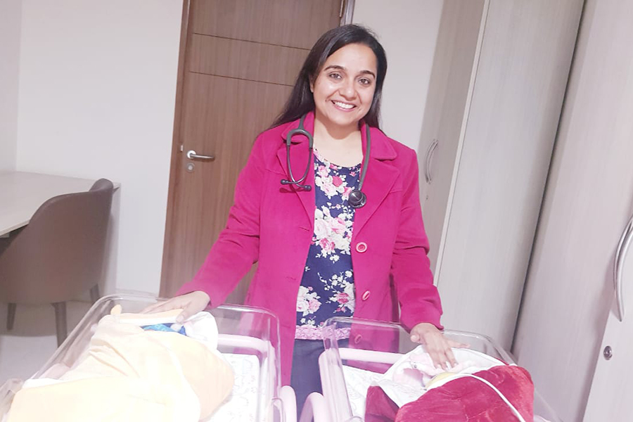 Dr Amreen with newborn children